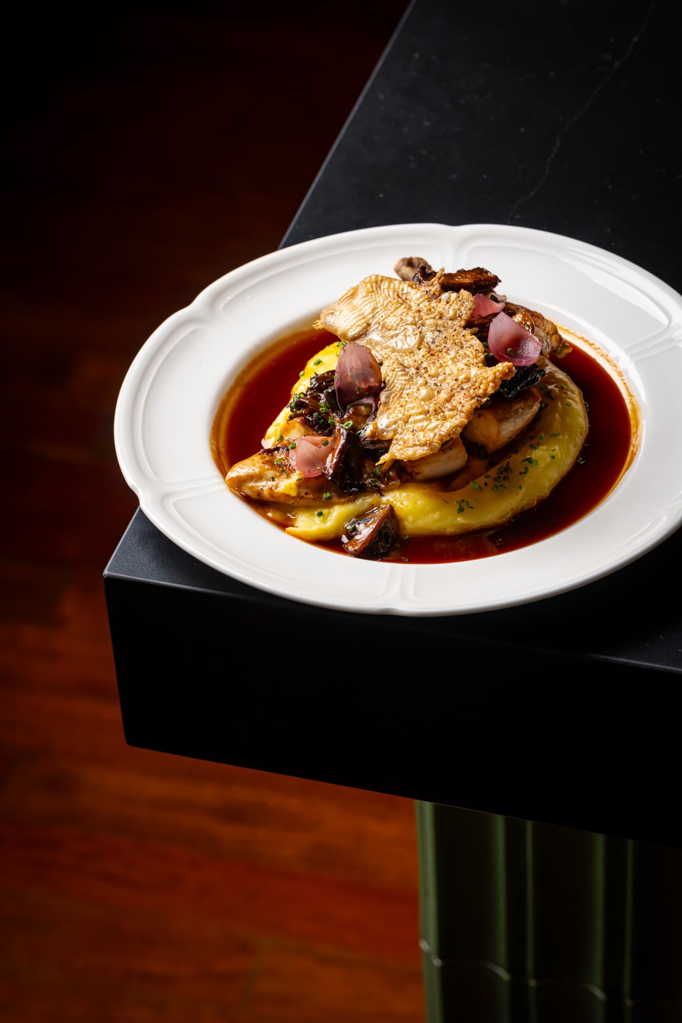 A plated chicken dish at The Berczy Tavern